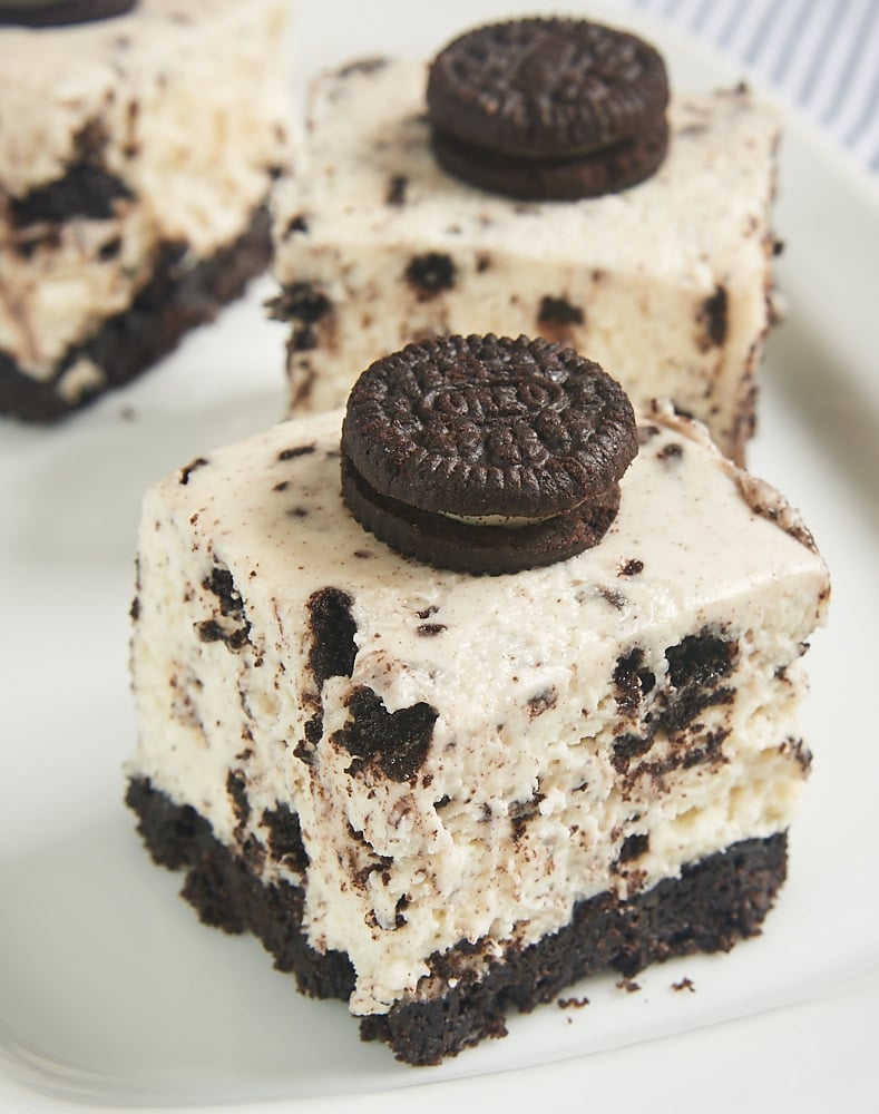 Oreo lovers will be in dessert heaven with these Cookies and Cream Cheesecake Bars. A cookie crust, a simple no-bake cheesecake, and lots of Oreos make these a sure crowd-pleaser! - Bake or Break