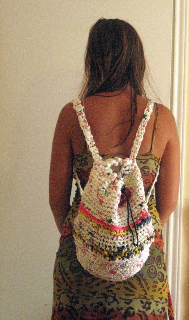 Many people who knit and crochet make eco-friendly yarn from plastic bags called "plarn." You can make a lot of cool things with plarn, like this backpack.