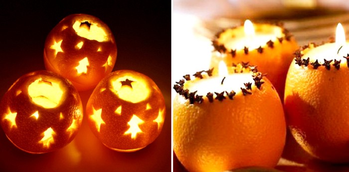 Выскребаем начинку из мандарина или апельсина, прорезаем острым резаком любые узоры и устанавливаем внутрь свечу