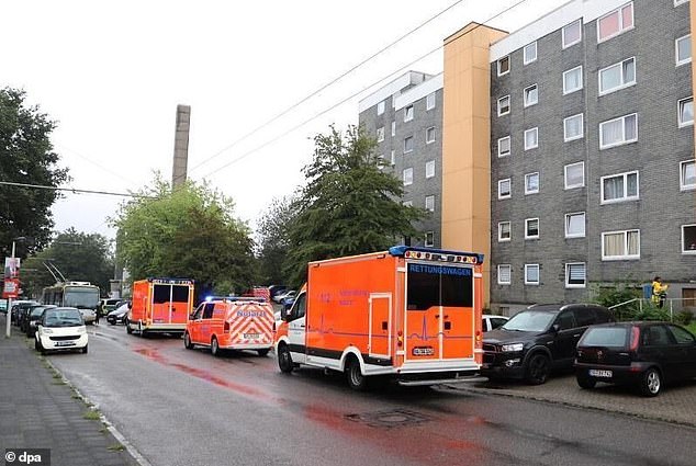 German police have found the bodies of five children in a building in the town of Solingen (pictured, emergency vehicles in front of the house)