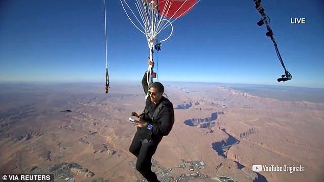 Blaine, who was equipped with a parachute, live streamed the stunt over Page, Arizona