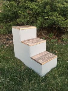 picture of white home made cat stairs with wooden steps