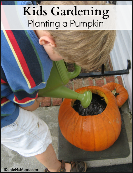 Kids Gardening Planting a Pumpkin