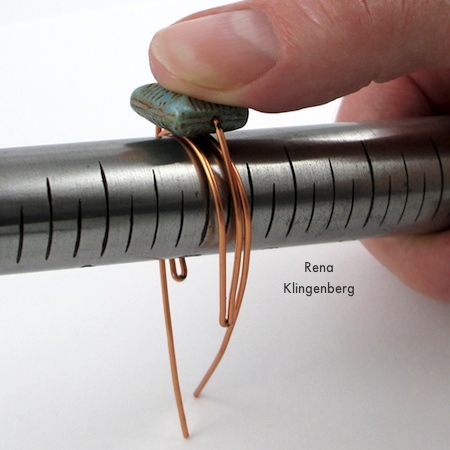 Shaping the ring around the mandrel - Adjustable Wire-Wrap Bead Ring - Tutorial by Rena Klingenberg