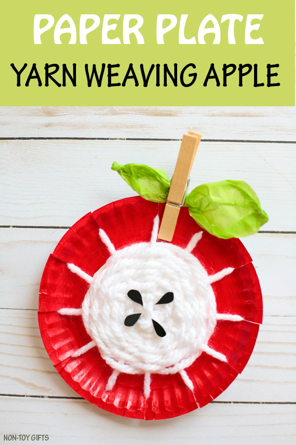 Paper plate yarn weaving apple craft for kids to make this fall. Apple core craft. Autumn craft. 