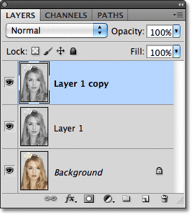 A copy of Layer 1 appears in the Layers panel. Image © 2011 Photoshop Essentials.com.