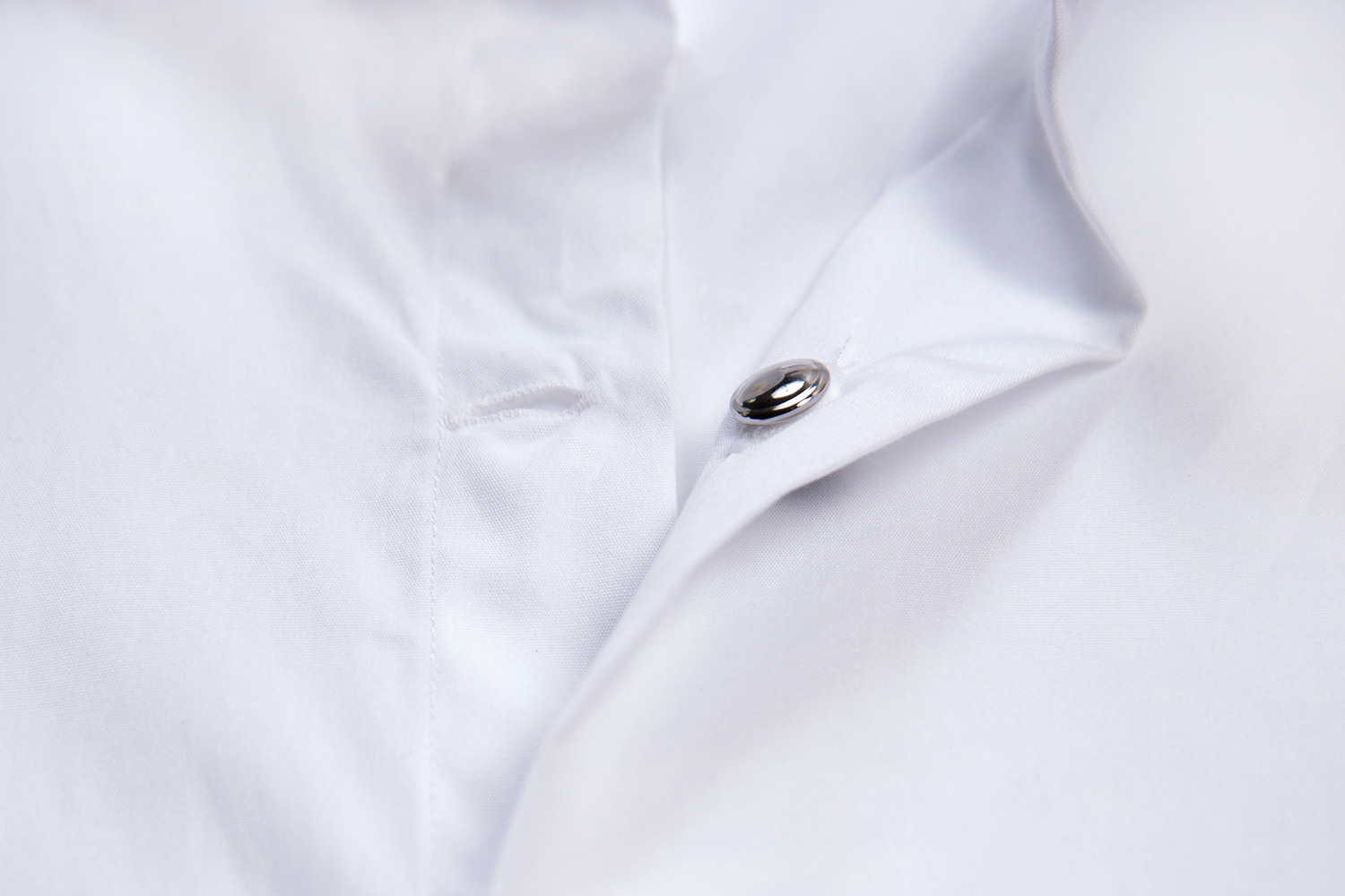 Inserting Studs into Tuxedo Shirt