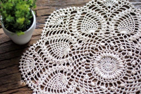 Pineapple Doily - Crochet doily patterns are unique and a great investment of time. They take skill and attention to detail and are perfect for relaxing. #crochetpatterns #crochetdoilypatterns #freecrochetpatterns #crochetaddict