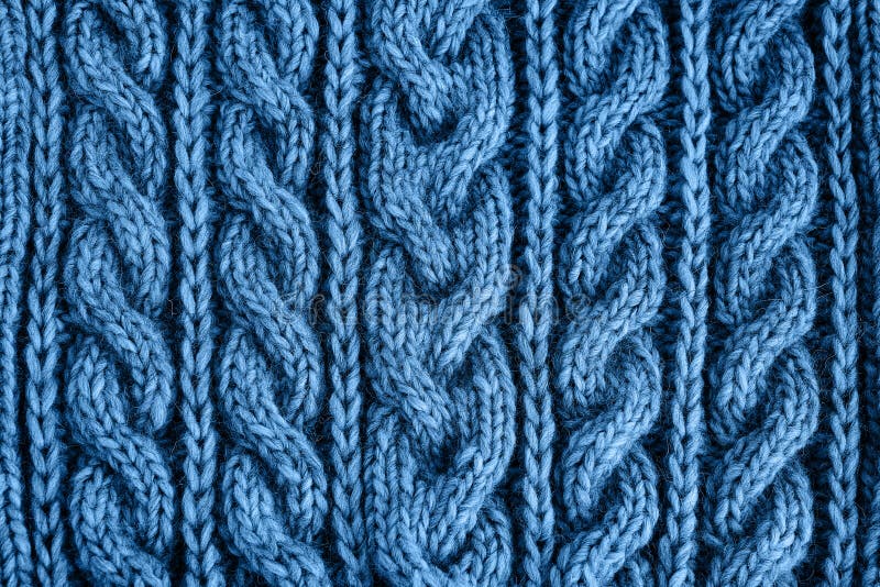 Blue knitted texture. Handmade Knitwear. Background. Color of the year. 2020 stock image