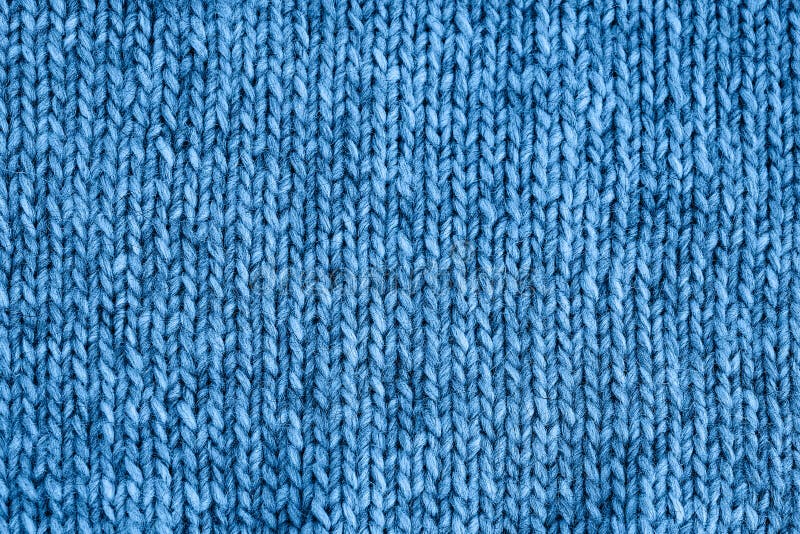 Blue knitted texture. Handmade Knitwear. Color of the year 2020 classic blue toned. Background. Blue knitted texture. Handmade Knitwear. Color of the year 2020 stock photography