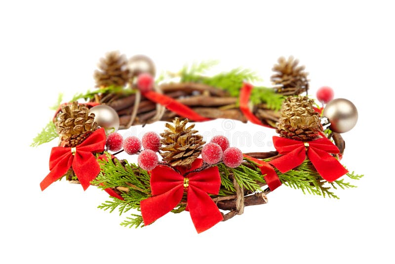 christmas wreath with red ribbon,pine cones and golden decoration isolated on white background stock images