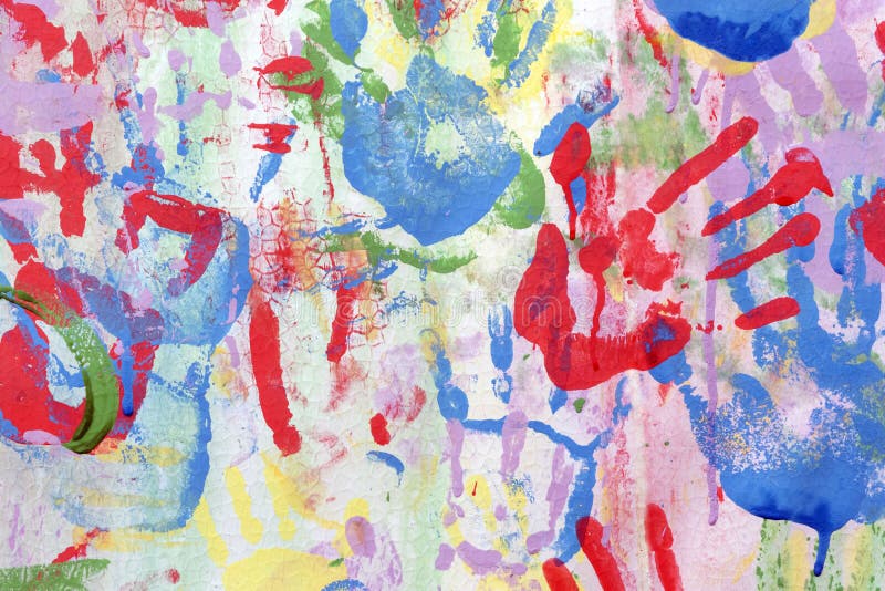 Color background of children`s handprints. Multi colored hand prints stock image