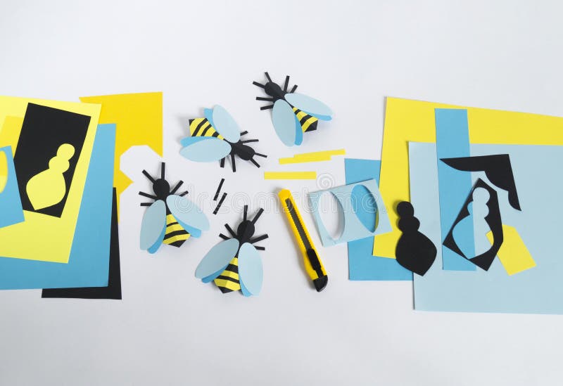 Creativity with children. Master class on creating bees from paper. Application of colored paper. School. Kindergarten stock image