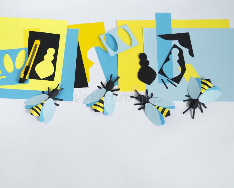 Creativity with children. Master class on creating bees from paper. Application of colored paper. School. Kindergarten stock photography