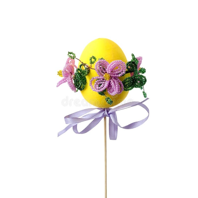 Decorative Easter Egg. Easter egg with decorative beads on a white background stock photography