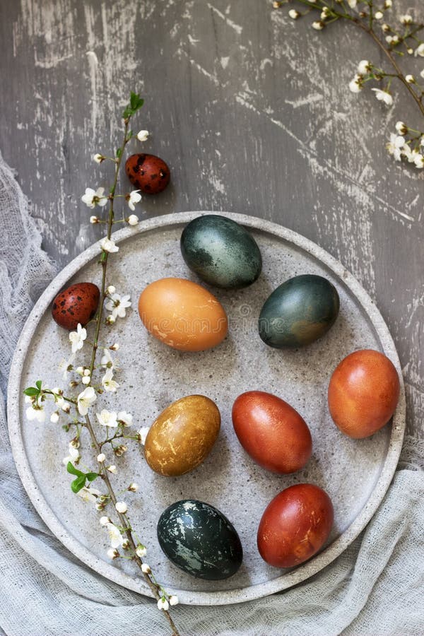 Easter eggs dyed with natural dyes, cabbage, chamomile, hibiscus and onion peel. Selective focus stock photos