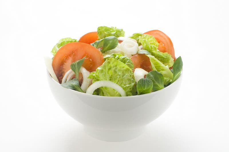 Fresh natural salad bowl tomato lettuce onion. Oil vinegar royalty free stock photo