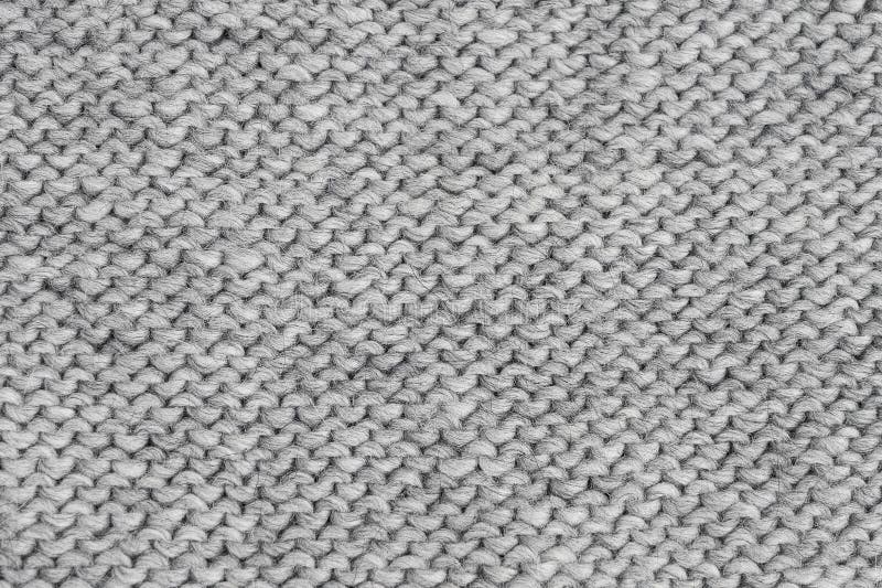 Gray knitted texture. Handmade Knitwear. Background. Gray knitted texture. Handmade Knitwear, reverse stitch. Background stock photography