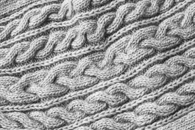 Gray knitted texture. Handmade Knitwear. Background. Gray knitted texture. Handmade Knitwear. Top view stock photo