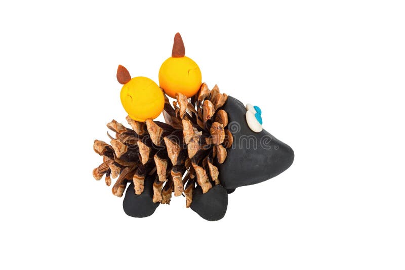 Hedgehog from pine cone and plasticine. stock image
