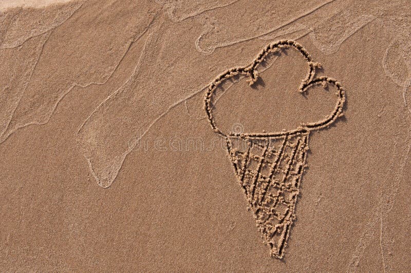 Ice cream. Hand drawn with stick on sand on beach. Beach background. Top view stock image