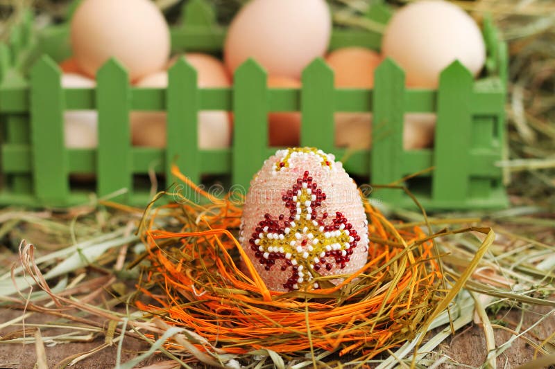 Image of easter egg decorated with beads stock photography