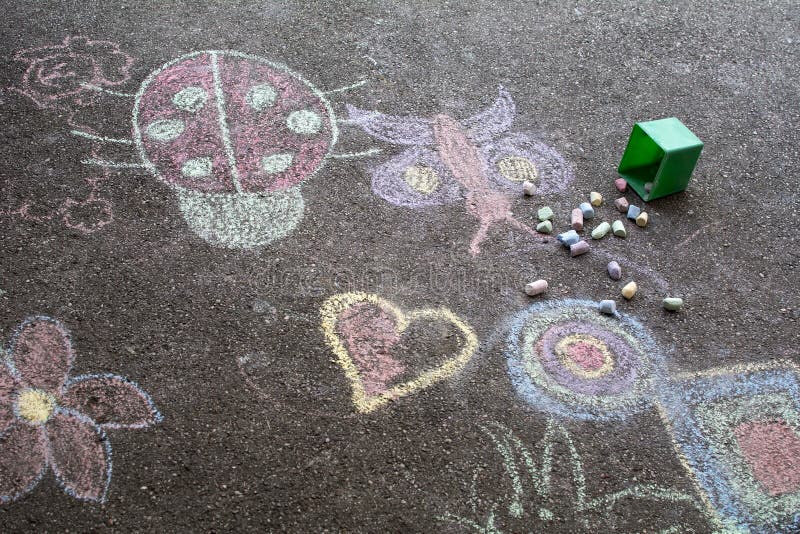 Kids drawing on asphalt. Kids were drawing on an asphalt royalty free stock photo