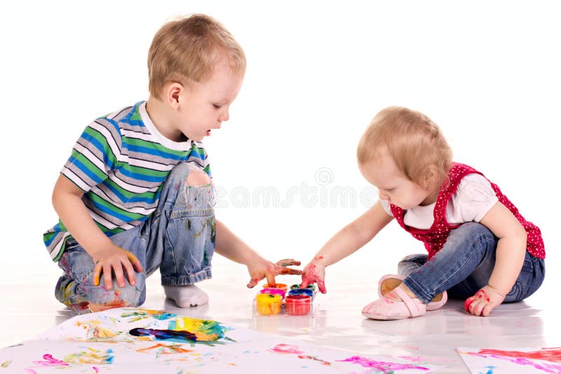 Little children are drawing with hands. Little children are drawing pictures isolated on white stock photography