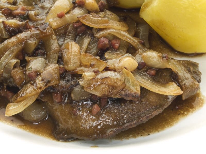 Liver with onions. Fried beef liver with onions and potatoes royalty free stock photos