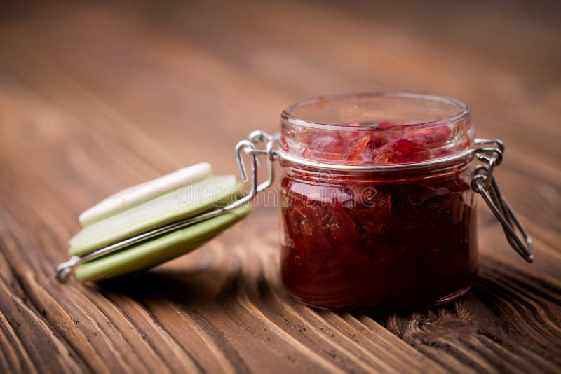 Natural diy red onion marmalade. Homemade DIY natural healthy red onion marmalade with rasberry sirup royalty free stock images