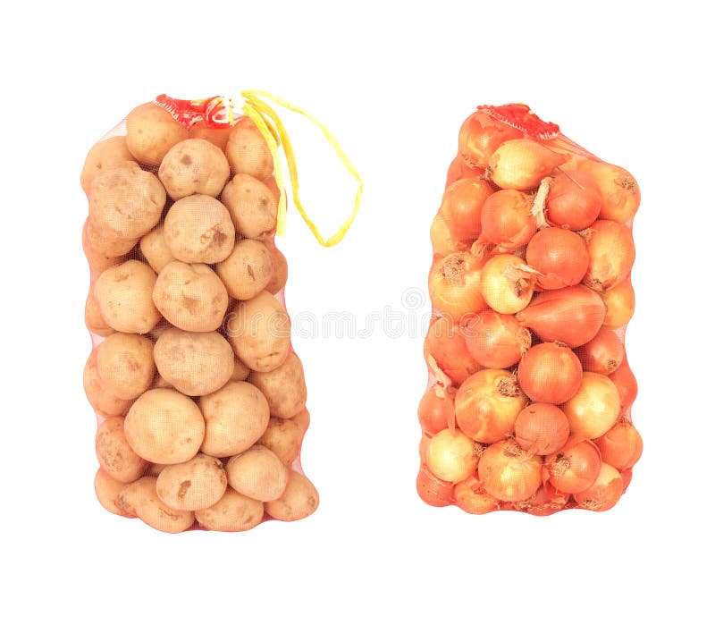 Onions and potatoes. Bag of onions and potatoes on a white background royalty free stock image