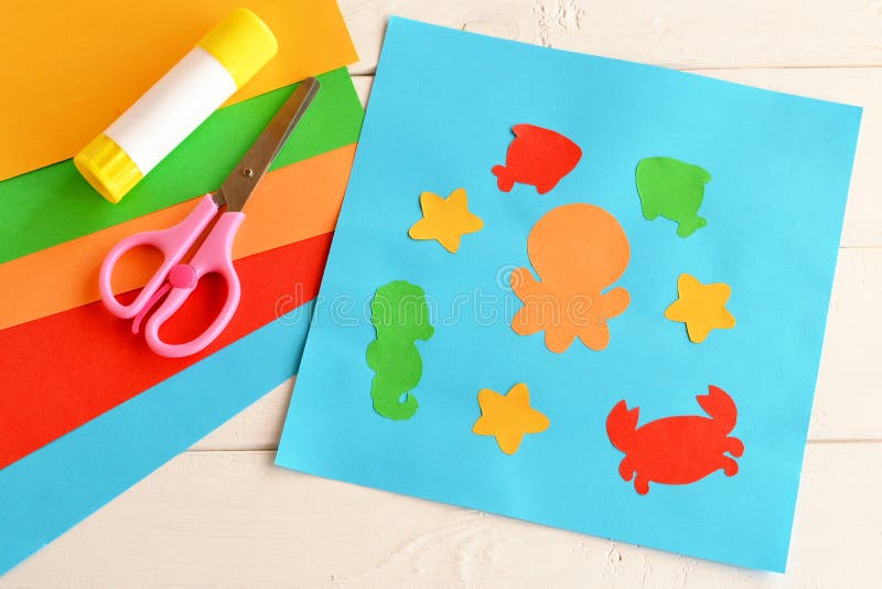 Paper applique with sea animals and fishes. Art lesson in kindergarten. Paper sea animals - octopus, fish, starfish, seahorse royalty free stock image