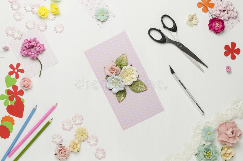 Postcard from paper flowers. Scrapbooking. Creative mess. The view from the top royalty free stock images