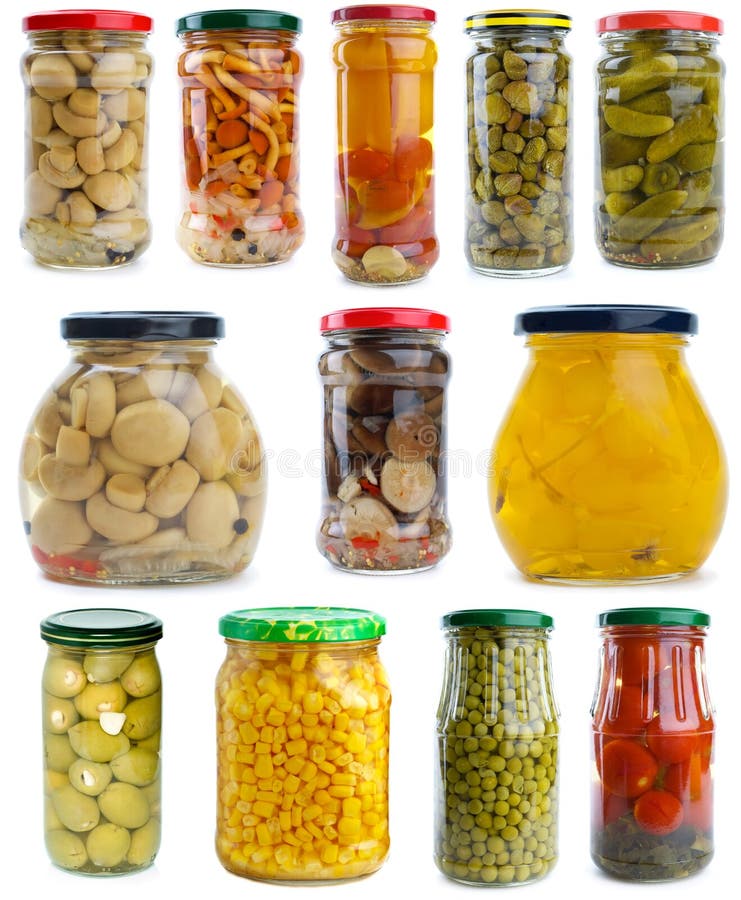 Set of different fruits & vegetables in glass jars. Set of different berries, mushrooms and vegetables conserved in glass jars isolated on the white background stock photos